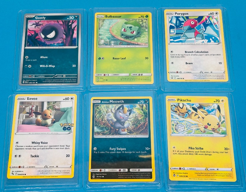 Photo 1 of 151745…6 Pokémon trading  cards in hard plastic sleeves 