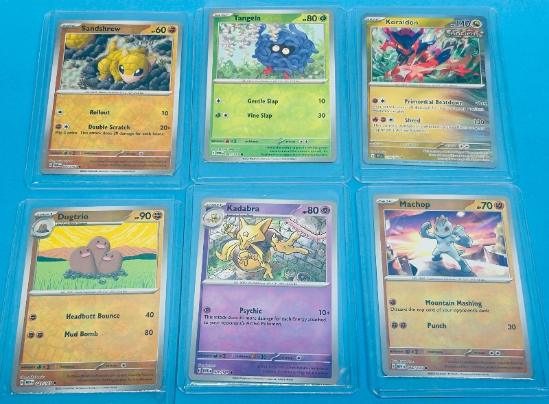 Photo 1 of 151746…6 reverse holo Pokemon  cards in hard plastic sleeves 