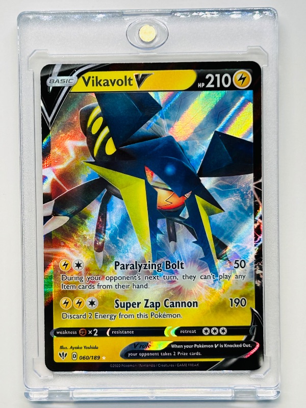 Photo 1 of 151755…holo Pokémon V card in hard plastic case 060/189