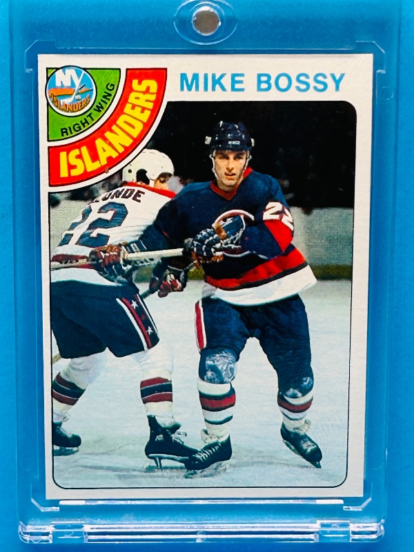 Photo 1 of 151758…Rookie Mike Bossy card 115 in hard plastic case 