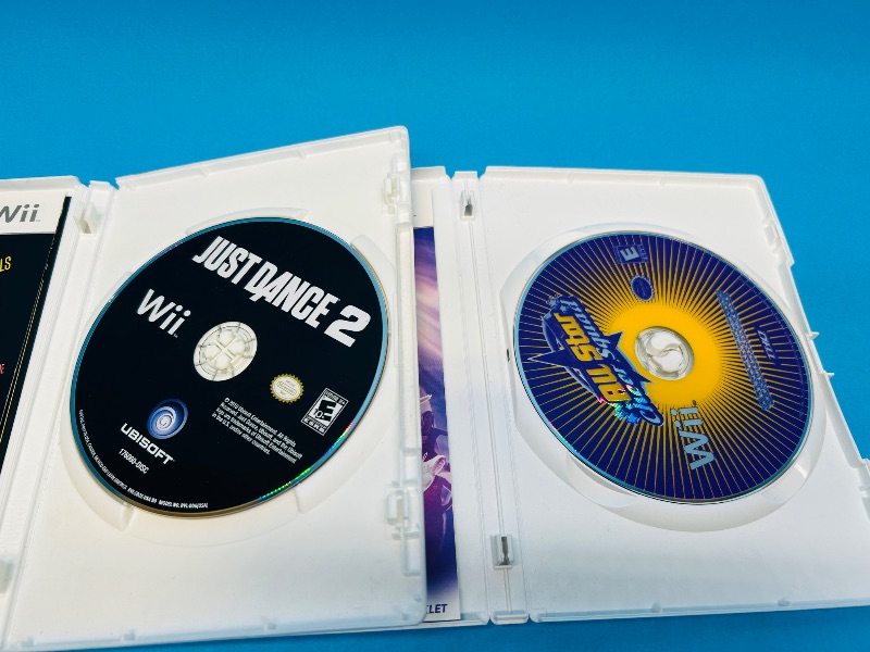 Photo 1 of 151872…2 Wii game discs 