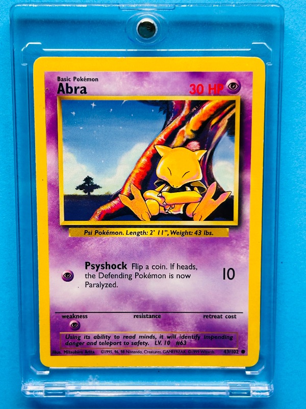 Photo 1 of 151933…Pokémon Abra card 43/102  in hard plastic case