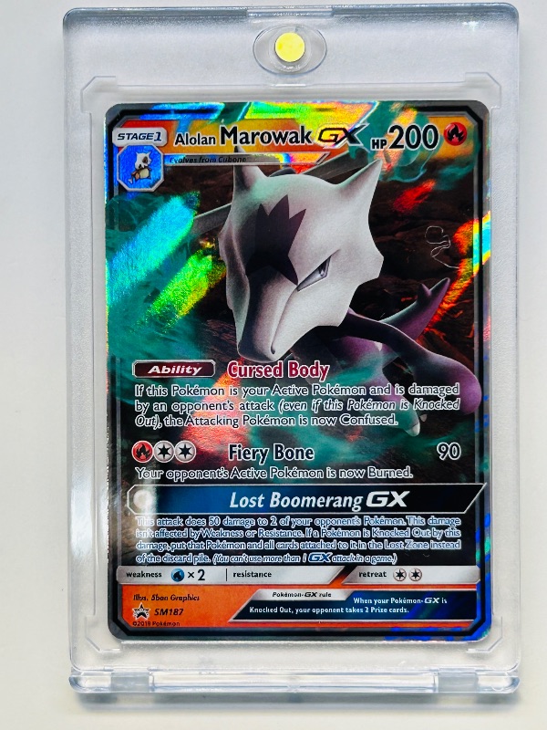 Photo 1 of 152139…Pokémon holo Marowak GX card SM187 in hard plastic case