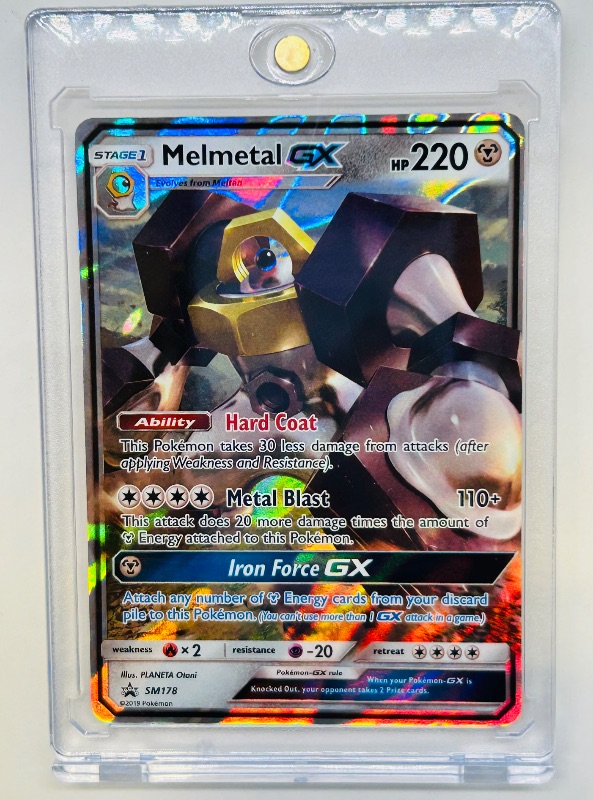 Photo 1 of 152145…Pokémon holo Melmetal GX card SM178 in hard plastic case