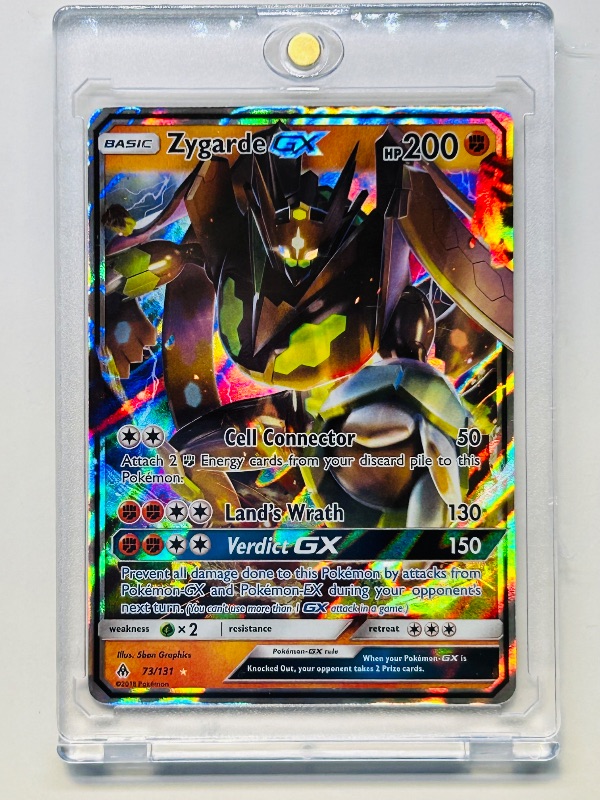 Photo 1 of 152147…Pokémon holo Zygarde GX card 73/131 in hard plastic case