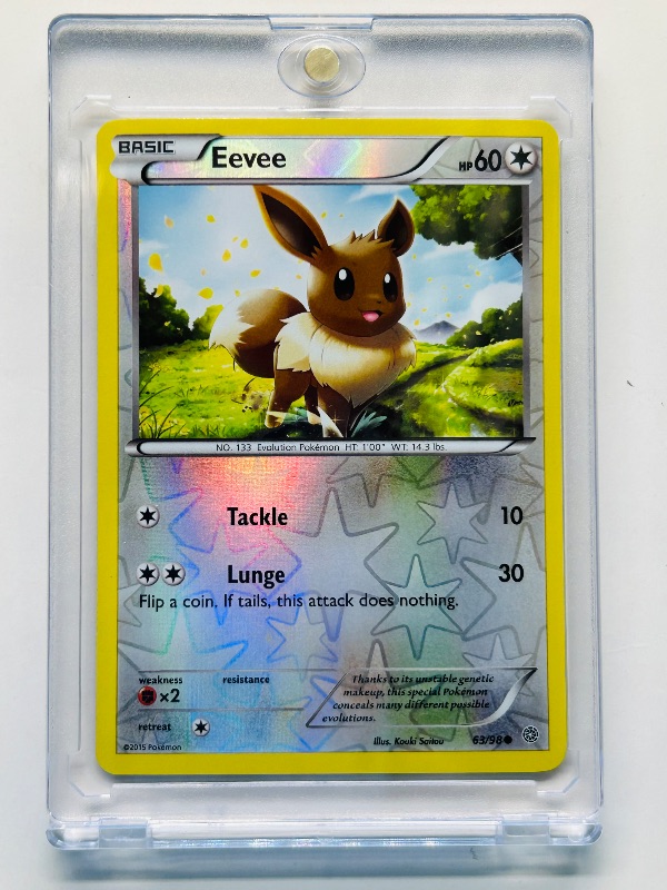 Photo 1 of 152153…Pokémon reverse holo Eevee card 63/98 in hard plastic case