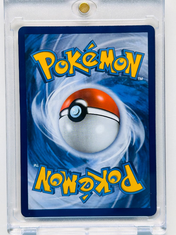 Photo 1 of 152153…Pokémon reverse holo Eevee card 63/98 in hard plastic case