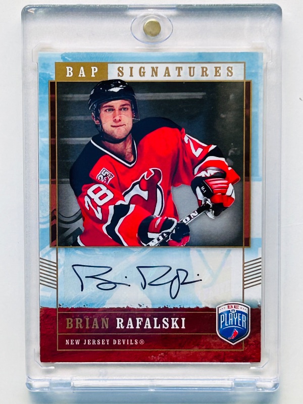 Photo 1 of 152157…Autographed Brian Rafalski card RA in hard plastic case
