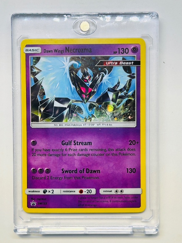 Photo 1 of 152159…Pokémon holo Dawn Wings Necrozma card SM123 in hard plastic case