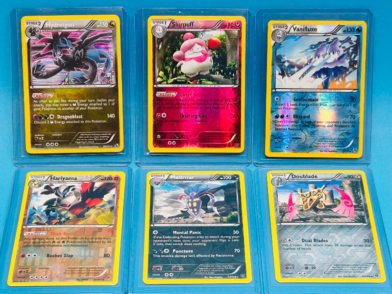 Photo 1 of 152172… 6 Pokémon reverse and holo cards in plastic sleeves 