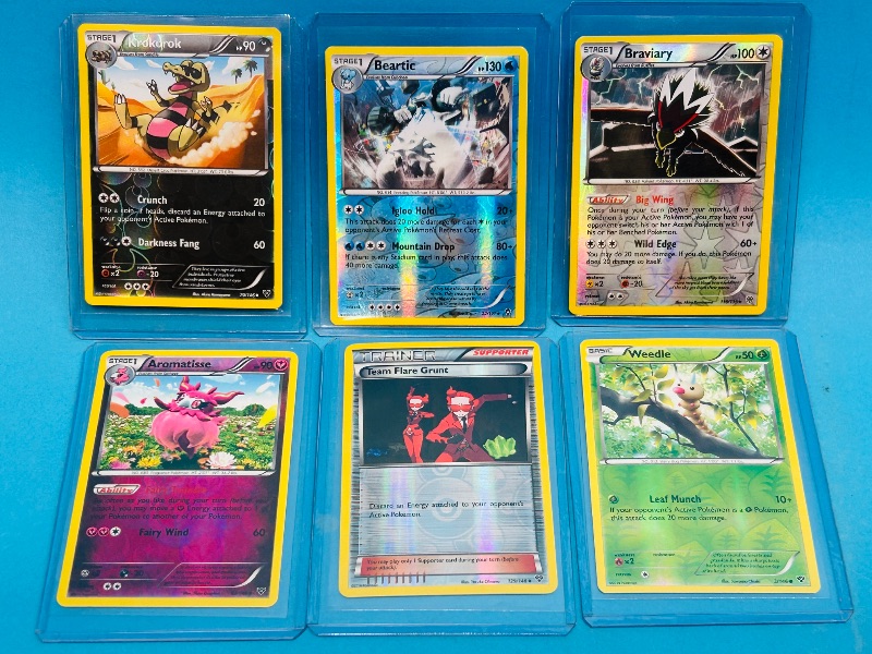 Photo 1 of 152173… 6 Pokémon reverse and holo cards in plastic sleeves 