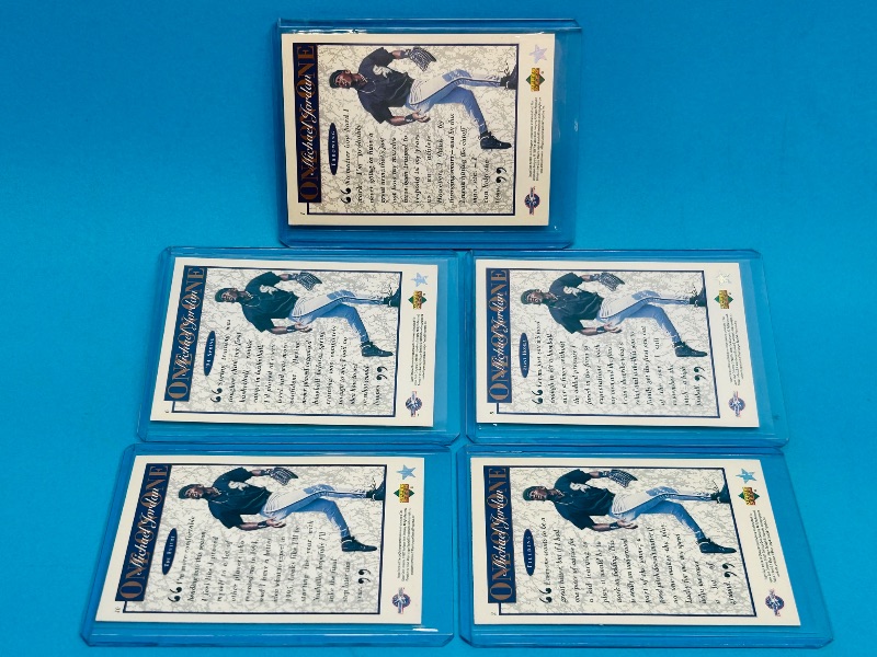 Photo 1 of 152249…5 Michael Jordan one on one cards in hard plastic sleeves 