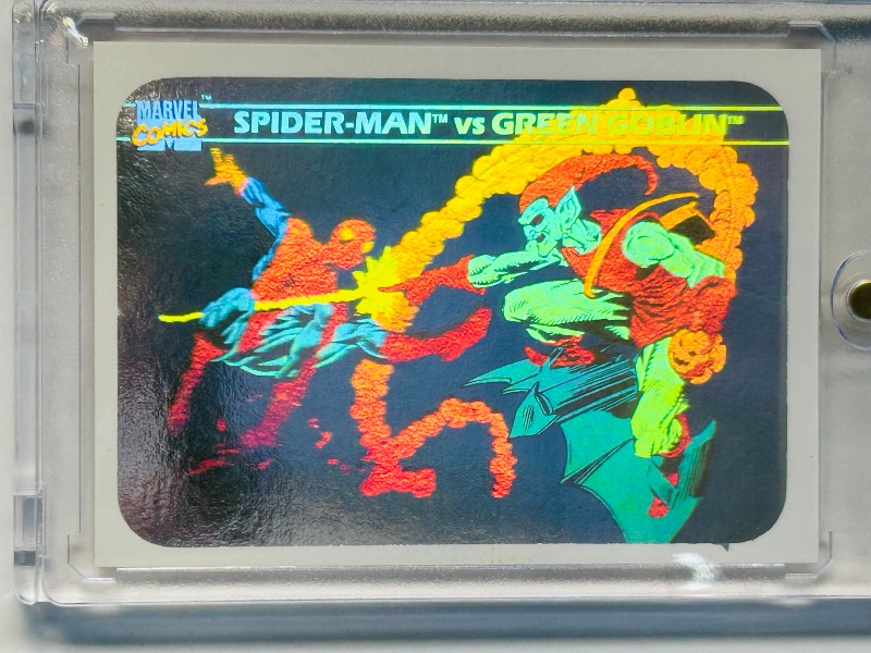 Photo 1 of 152253…marvel 1990 Hologram spider-Man vs. green goblin card MH5 in hard plastic case