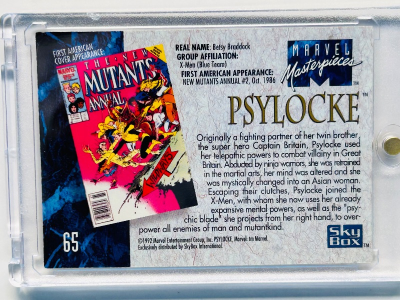 Photo 1 of 152279…marvel masterpieces Psylocke card 65  in hard plastic case