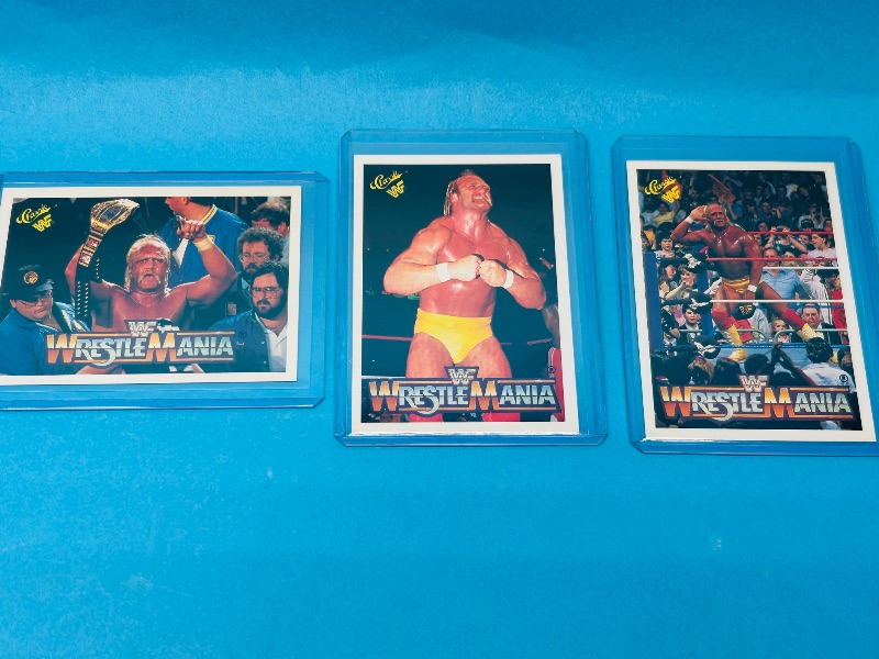 Photo 1 of 152285…5 vintage WWF Hulk Hogan wrestling cards in hard plastic sleeves 