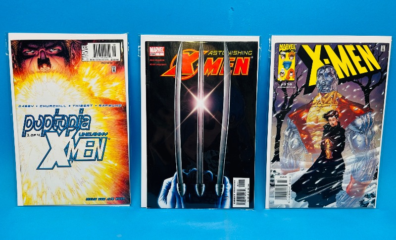 Photo 1 of 152334…3 X-men comics in plastic sleeves 