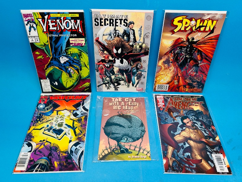 Photo 1 of 152357…6  comics in plastic sleeves 