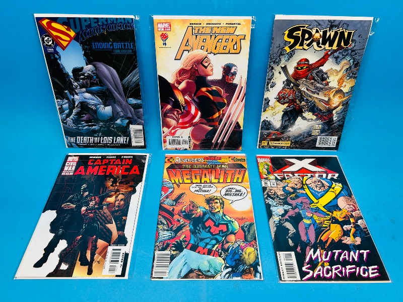 Photo 1 of 152358…6  comics in plastic sleeves 