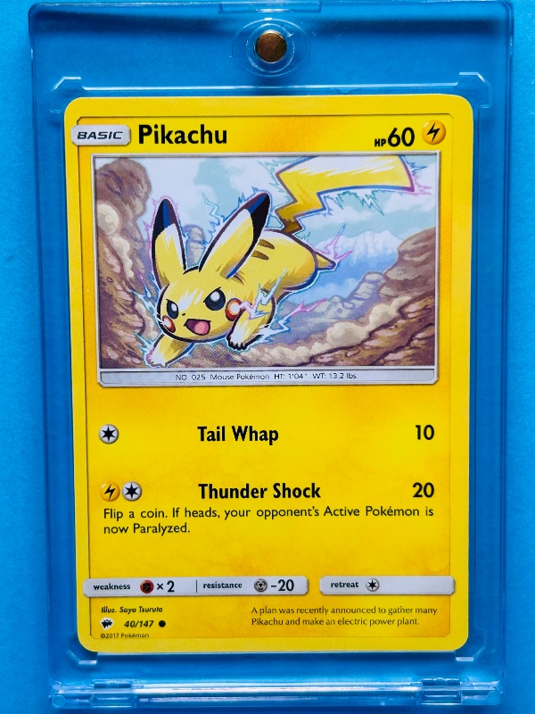 Photo 1 of 152402… Pokémon Pikachu card in hard plastic case 