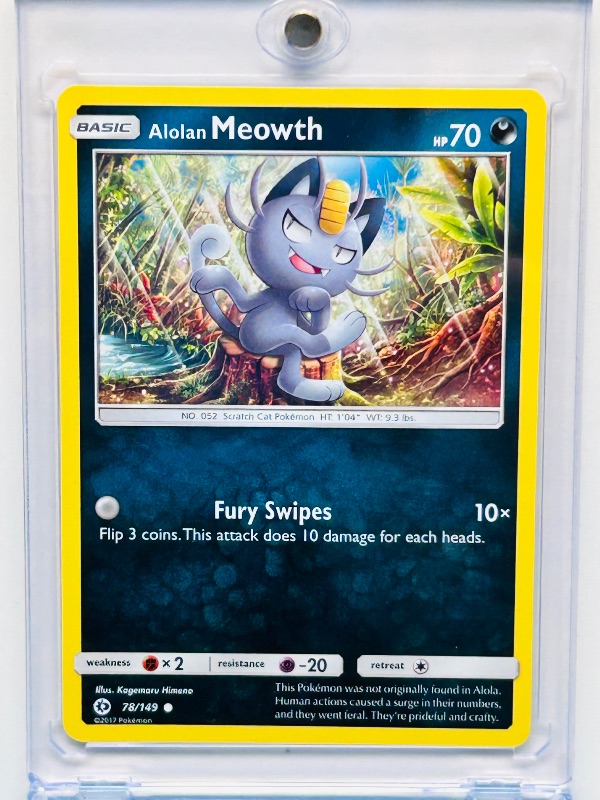 Photo 1 of 152405… Pokémon Alolan Meowth card in hard plastic case 