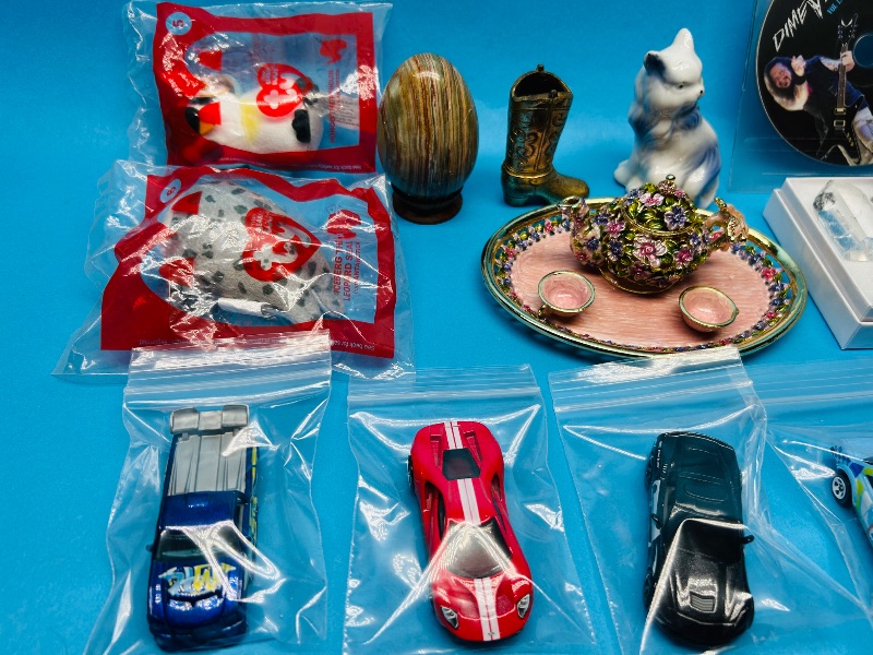 Photo 1 of 152411…final sale no returns/refunds- misc items, nicknacks, coins, and toys