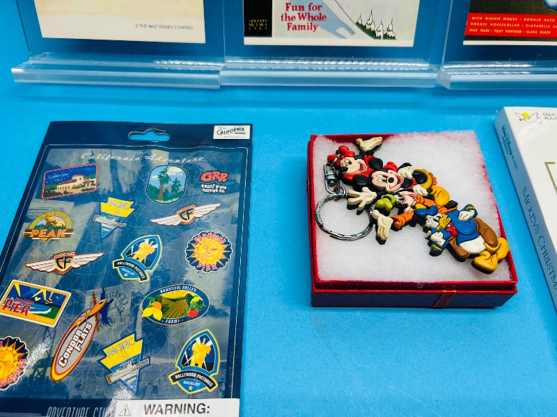Photo 1 of 152412…vintage Disney items, post cards, cassette tape, stickers 