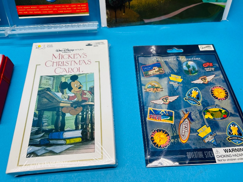 Photo 1 of 152412…vintage Disney items, post cards, cassette tape, stickers 