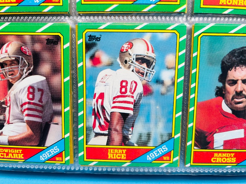 Photo 1 of 152413…final sale no returns/refunds- Complete 396 card set- Rookie Jerry Rice- Topps 1986 football cards in binder 