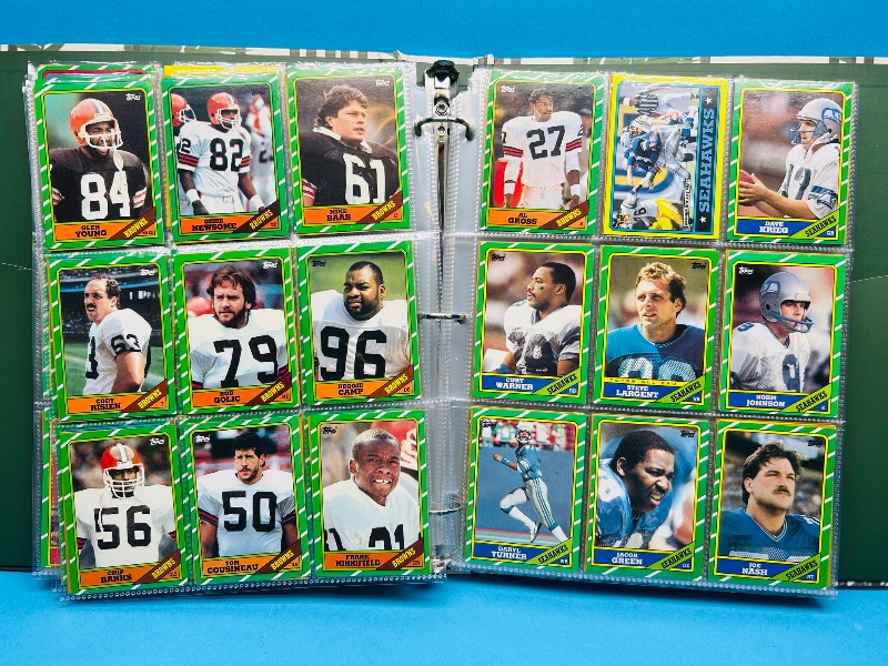 Photo 1 of 152413…final sale no returns/refunds- Complete 396 card set- Rookie Jerry Rice- Topps 1986 football cards in binder 