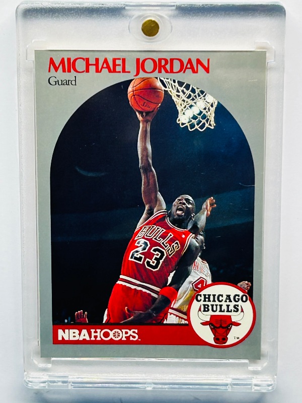 Photo 1 of 152431…Michael Jordan card 65 in hard plastic case