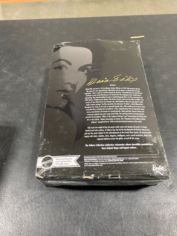 Photo 1 of Barbie Collector Signature Doll, María Félix Wearing Elegant, Glimmering Gold and Black Gown with Ornate Jewelry, Barbie Tribute Collection
