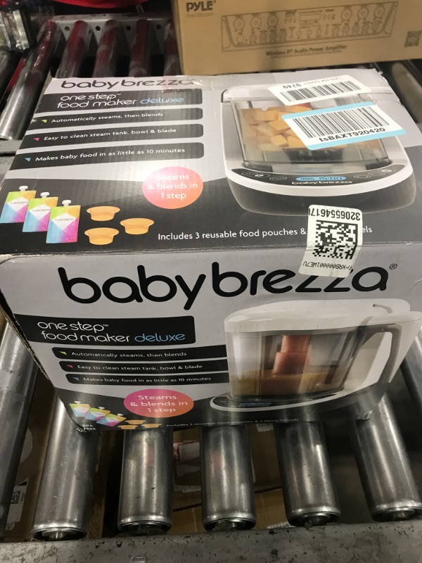 Photo 2 of Baby Brezza One Step Baby Food Maker Deluxe – Cooker and Blender in One to Steam and Puree Baby Food for Pouches - Make Organic Food for Infants and Toddlers - Set Includes 3 Pouches and 3 Funnels