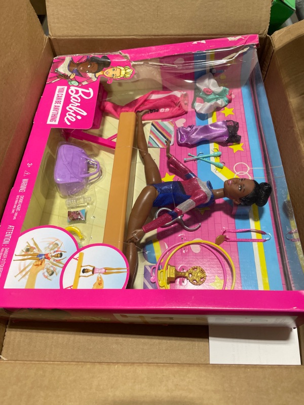 Photo 2 of Barbie Gymnastics Playset with Doll and 15+ Accessories, Twirling Gymnast Toy with Balance Beam, Brunette Doll