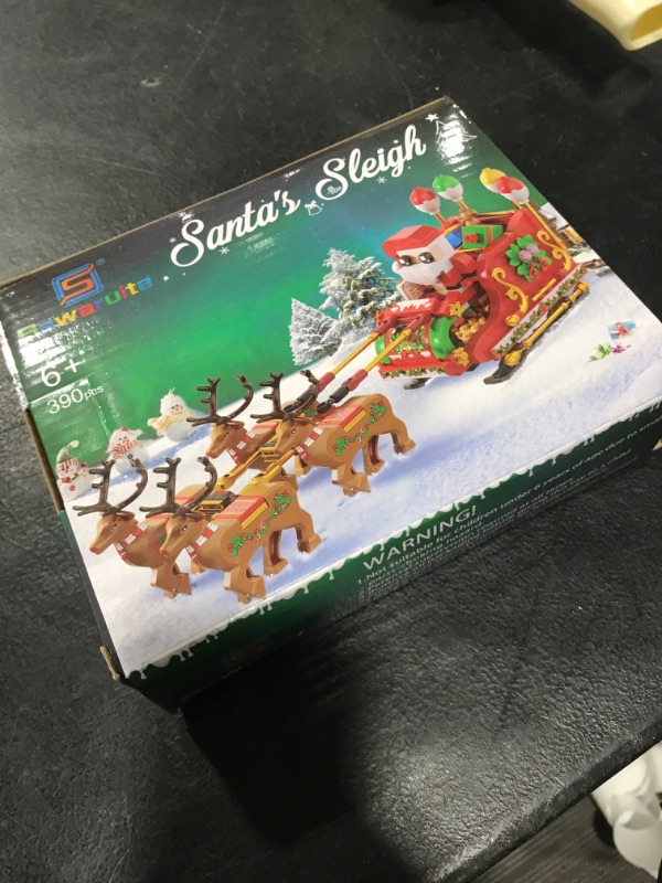 Photo 2 of Christmas Santa's Sleigh Building Sets,Santa Claus and Christmas Reindeer Figures Building Blocks Bricks Set Toys for Kids Ages 6+,Suitable for Christmas and Birthday Gifts