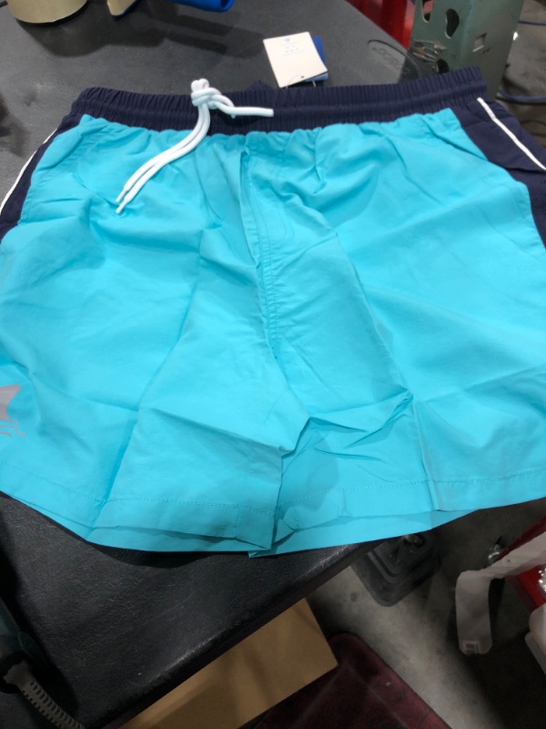 Photo 1 of BLUE SWIM TRUNKS FOR MEN LARGE 