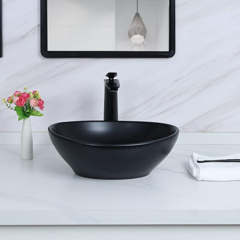 Photo 1 of Davivy 15.7'' Matte Black Oval Vessel Sink with Pop Up Drain,Bathroom Sinks Above Counter,Bathroom Vessel Sinks,Ceramic Vessel Sink,Counter top Sink,Matte Black Vessel Sinks
