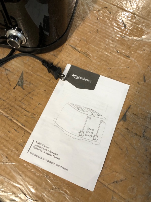 Photo 5 of **HALF OF THE SLOTS DO NOT FUNCTION**
4 Slot toaster (amazon basics)