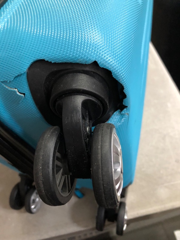 Photo 7 of **MAJOR DAMAGE SEE NOTES**
Rockland London Hardside Spinner Wheel Luggage, Turquoise, Carry-On 20-Inch Turquoise