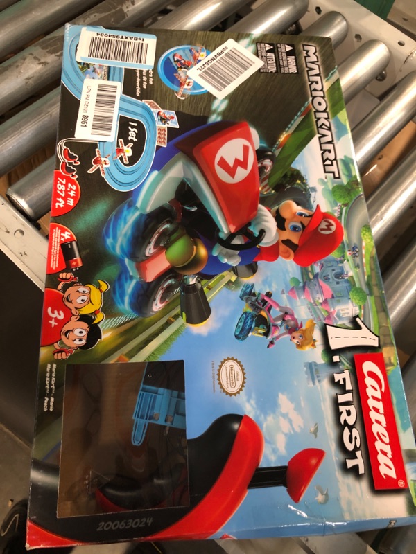 Photo 2 of Carrera First Mario Kart - Slot Car Race Track with Spinners - Includes 2 Cars: Mario and Peach - Battery-Powered Beginner Racing Set for Kids Ages 3 Years and Up Mario Kart w/ Peach