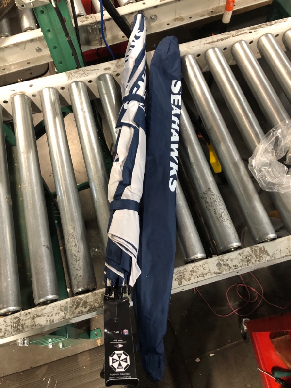 Photo 3 of Team Golf NFL 62" Golf Umbrella with Protective Sheath, Double Canopy Wind Protection Design, Auto Open Button Seattle Seahawks One Size Multi Team Color