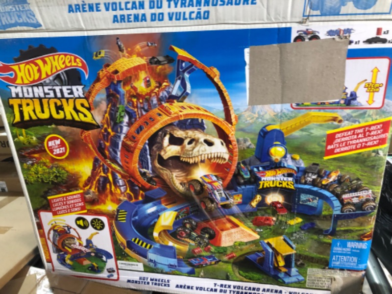 Photo 3 of ?Hot Wheels Monster Trucks, T-Rex Volcano Playset with Lights and Sounds, 1:64 Scale Race Ace Monster Truck