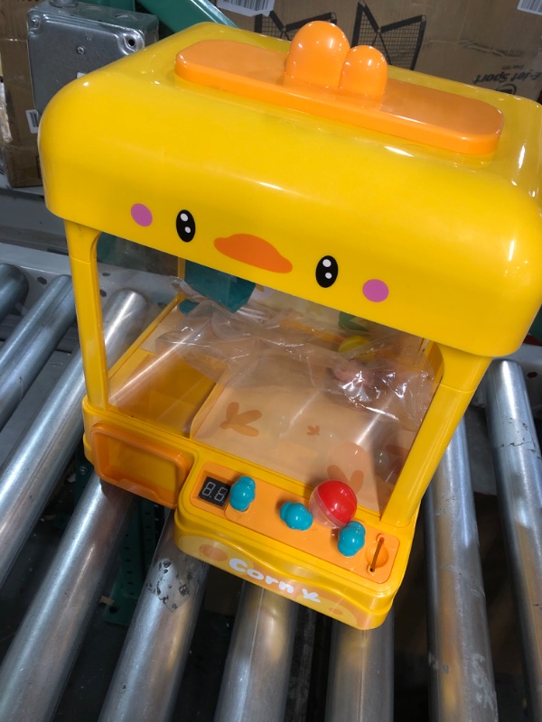 Photo 2 of **MISSING PRIZES**
cxjoigxi Mini Claw Machine for Kids with Prizes 