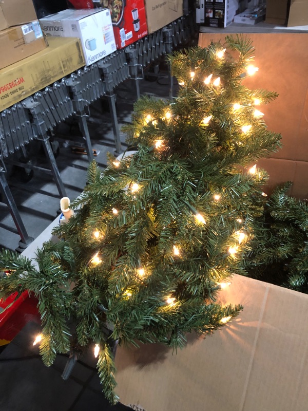Photo 5 of ***USED - POWERS ON - UNABLE TO TEST FURTHER***
Puleo International 7.5 Foot Pre-Lit Slim Fraser Fir Artificial Christmas Tree with 500 Clear UL Listed Lights, Green
