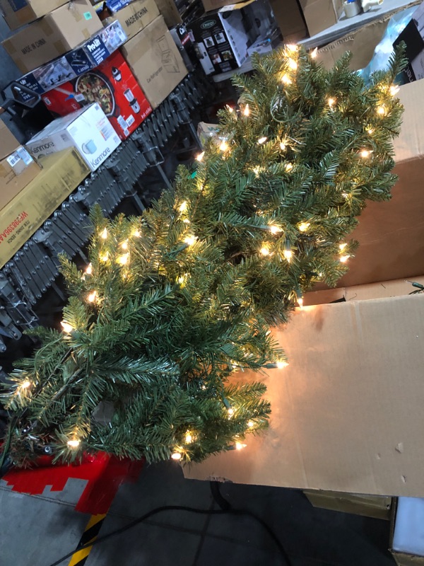 Photo 6 of ***USED - POWERS ON - UNABLE TO TEST FURTHER***
Puleo International 7.5 Foot Pre-Lit Slim Fraser Fir Artificial Christmas Tree with 500 Clear UL Listed Lights, Green