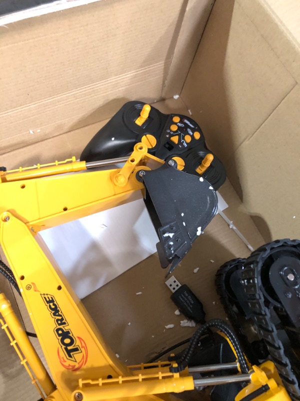 Photo 1 of Top Race 15 Channel Full Functional Remote Control Excavator Construction Tractor, Excavator Toy with 2.4Ghz Transmitter and Metal Shovel – TR 211 RC Excavator