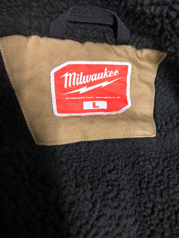 Photo 2 of heavy duty milwaukee sherpa lined vest large 