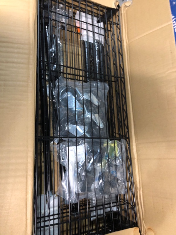 Photo 1 of AmazonBasics 4-Shelf Shelving Unit on 3'' Casters, Black