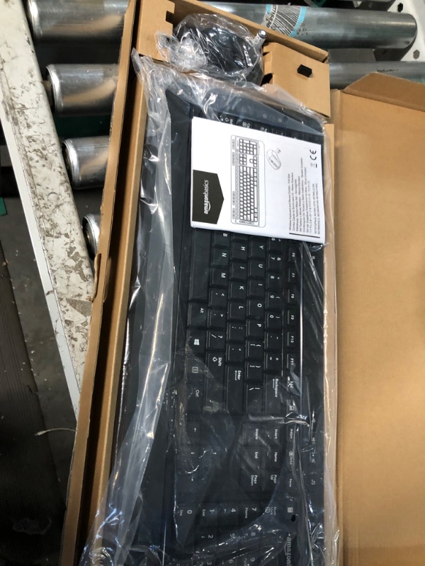 Photo 1 of Amazon Basics Wireless Computer Keyboard and Mouse Combo - Full Size - US Layout (QWERTY) & Gel Computer Mouse Pad with Wrist Support Rest