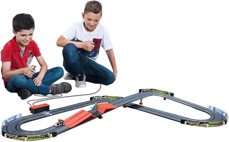 Photo 3 of (READ FULL POST) Carrera GO!!! 63503 Official Licensed Mario Kart Battery Operated 1:43 Scale Slot Car Racing Toy Track Set with Jump Ramp Featuring Mario and Luigi for Kids Ages 5 Years and Up
