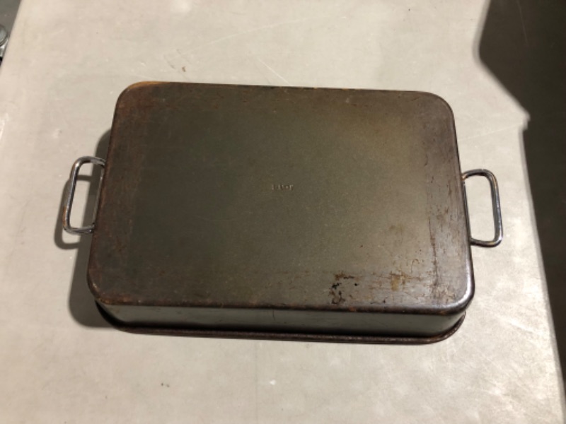 Photo 2 of ***HEAVILY USED AND FILTHY - SEE PICTURES***
T-FAL Cooking Pan with Handles, Black, 11" x 16", Tapered.